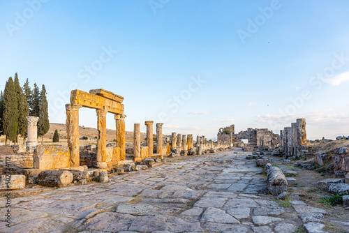 Ruins of the old colonnade. Frontina street. The ancient city of Hierapolis. Tourist place.
