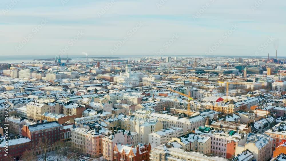 Aerial view Helsinki Finland. Urban cityscape of snowy winter city with historic houses.