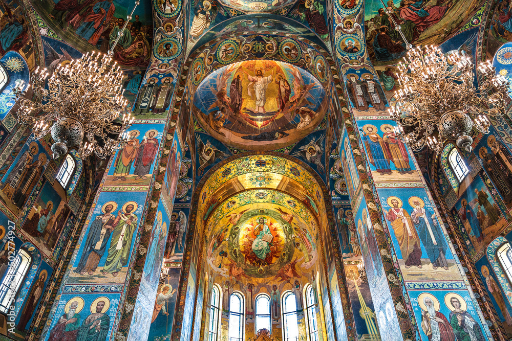 The interior of the Church of the Savior on Spilled Blood with colorful mosaic frescoes on biblical subjects. Saint Petersburg, Russia