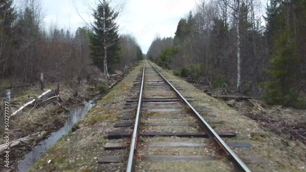 Aerial top down view spring deep forest with old rail road. Seasonal landscape. 2K Aerial top down view spring deep forest with old rail road. Seasonal landscape. 2K