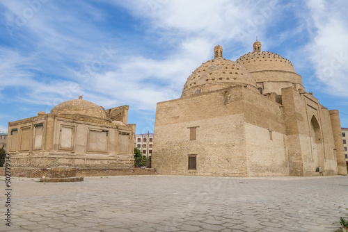 Historical buildings of 14-15 centuries in Bukhara, Uzbekistan. Left: mausoleum of Bayon Kulikhon, ruler of Chagatai Khanate. Right: mausoleum of Saifiddin Boharzi, popular sheikh, poet and theologian photo