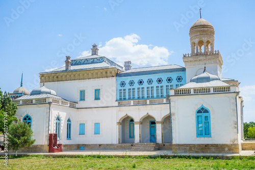 View of the harem building from the park. Shot at the former Emir country residence Sitorai Mohi Xosa in Bukhara, Uzbekistan photo