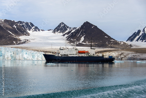 Expedition vessel in Arctic sea © Alexey Seafarer