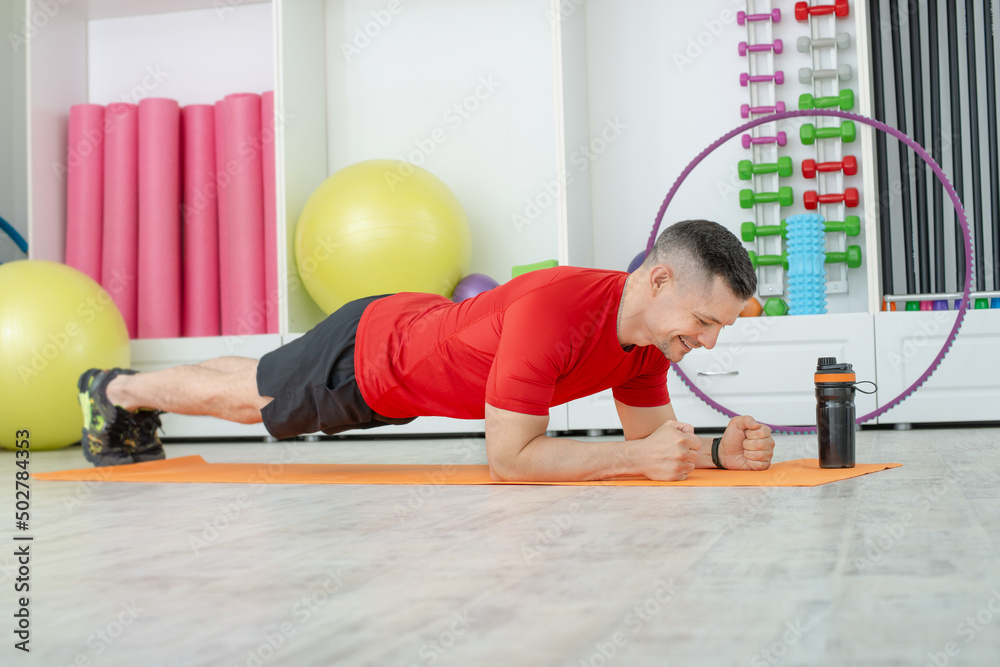 man exercise Elbow plank in gim man exercise Elbow plank in gim