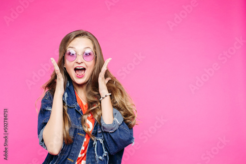 Swag girl in pink sunglasses screaming at studio.