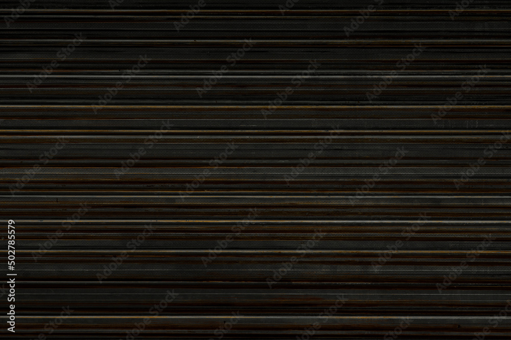 Old rusted metal wall. Dark grunge background Old rusted metal wall. Dark grunge background