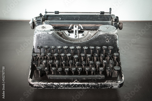 Vintage typewriter on an old desk.