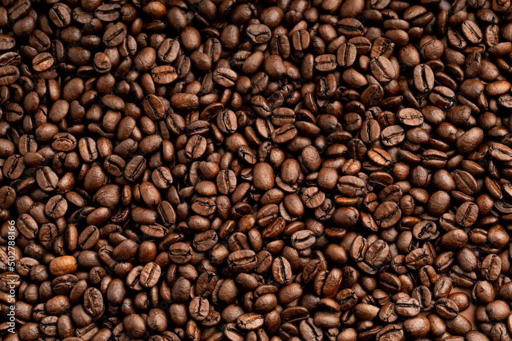Roasted coffee beans macro close up view