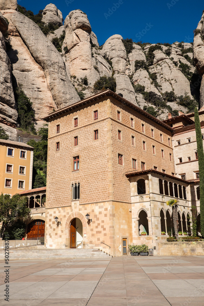 Beautiful View of Building with Rock in Catalan Montserrat. Architecture Exterior with Big Stones in Catalonia.