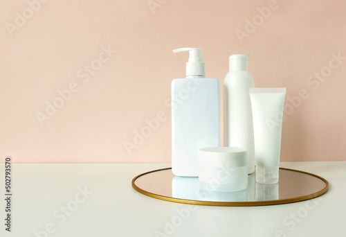 set of beauty products for skin or hair care. Taking care of the body and skin quality. cosmetic products, white tubes, branding mock up, top view on color background.