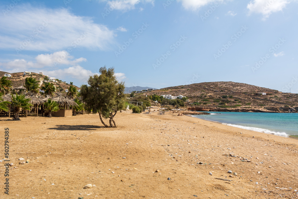 Koumbara beach with golden sand and white pebbles on Ios Island. Greece