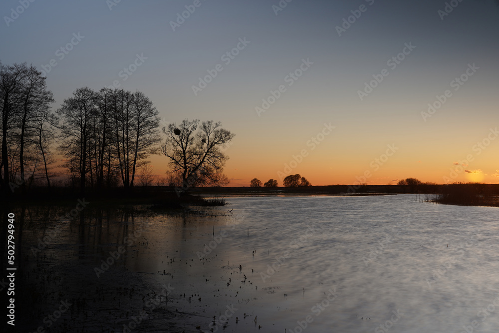 Twilight at Biebrza, spring landscape with river after sunset