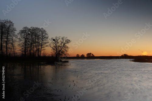 Twilight at Biebrza, spring landscape with river after sunset