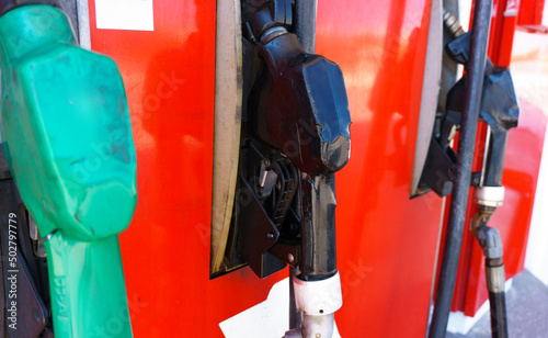Gasoline pumps lined up in the gas station closeup.