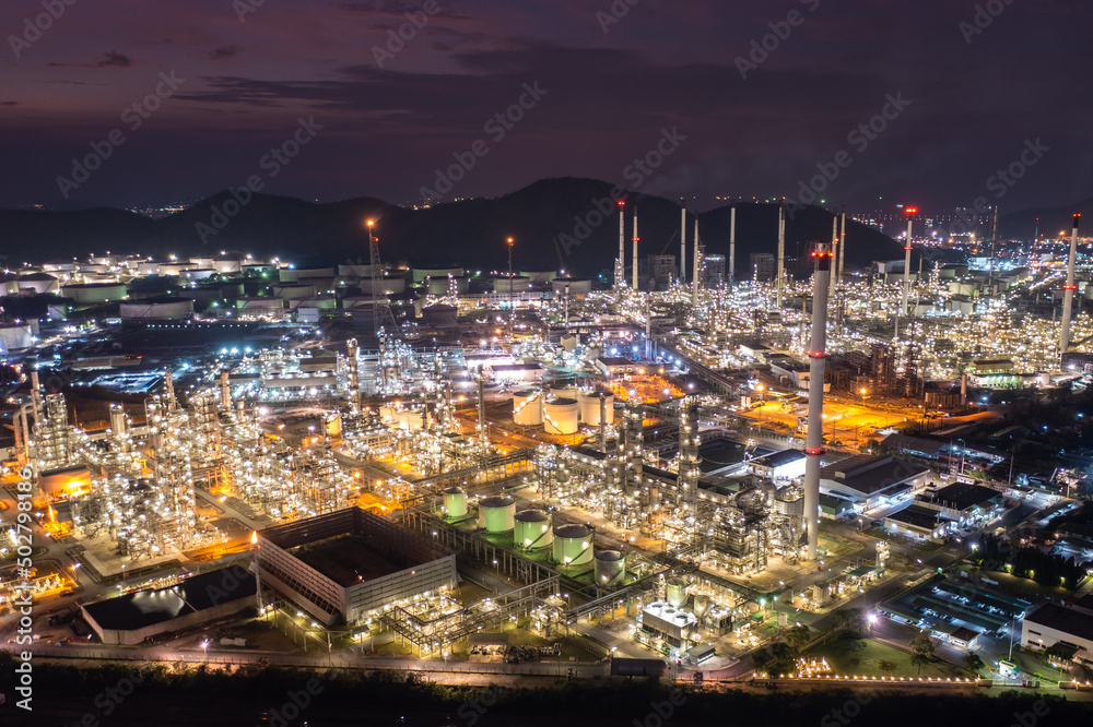Oil and gas industry - refinery, from drone camera ,Oil refinery and Petrochemical plant at night over lighting