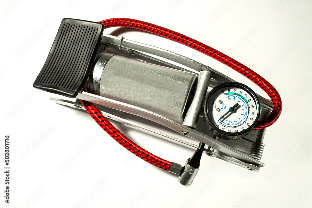 Silver Foot Pump for Car and Bicycle Tires Insulated on White Background