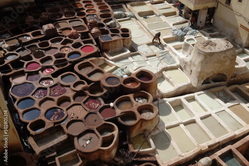 Old tank of Fes tanneries Morocco Africa leather dying in a traditional tannery
