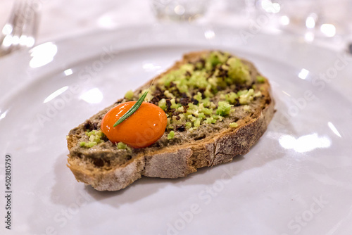 Tapenade of anchovies and couscous on toast, spanish tapa