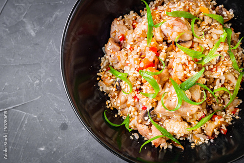 traditional chinese fried rice on black background