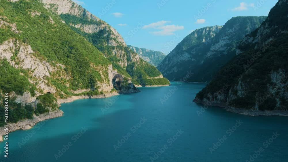 Montenegro. Durmitor National Park. Pivo lake. Canyon of the Tara River. Intense water color. Drone. Aerial view. Flight over the canyon. The camera moves up Montenegro. Durmitor National Park. Pivo lake. Canyon of the Tara River. Intense water color. Drone. Aerial view. Flight over the canyon. The camera moves up