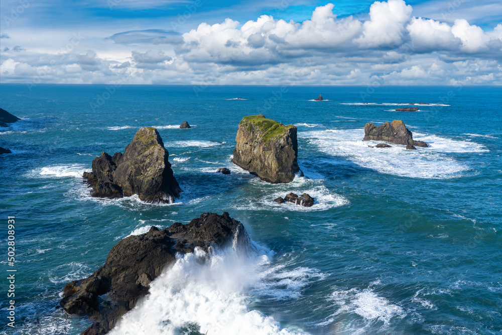 View of waves crashing on sea stacks near Arch Rock, Samuel Boardman Scenic corridor, Oregon coast