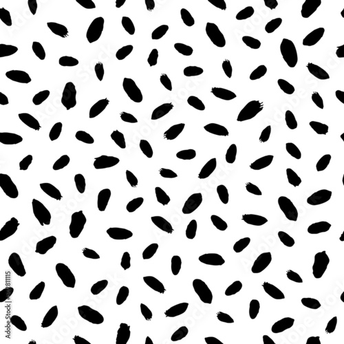 Black and white abstract oval spots pattern. 