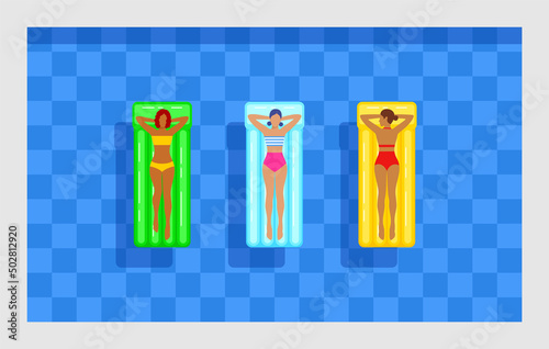 Young women in swimsuits floating on inflatable mattresses in blue swimming pool
