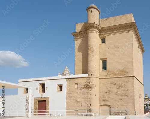 Iglesia de la Santa Cruz or old church with the tower of the Sagrario in Cadiz next to the Caleta beach in Spain