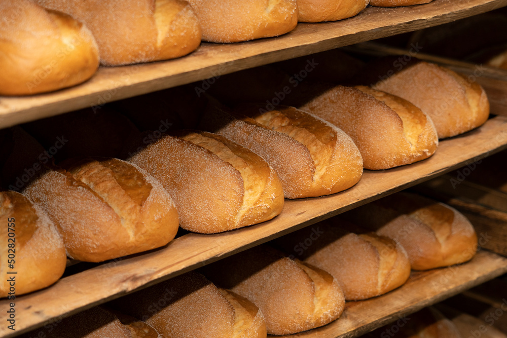 Fresh pastries close-up. Bakery products. Fresh bread close up. Loaves of bread on the shelves.