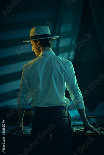 detective in dark room