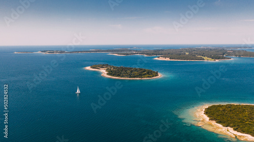 Aerial view of sailboat sailing Brijuni islands in Adriatic sea
