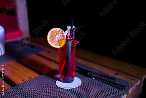 Fotografie Close-up of a red cocktail on the table