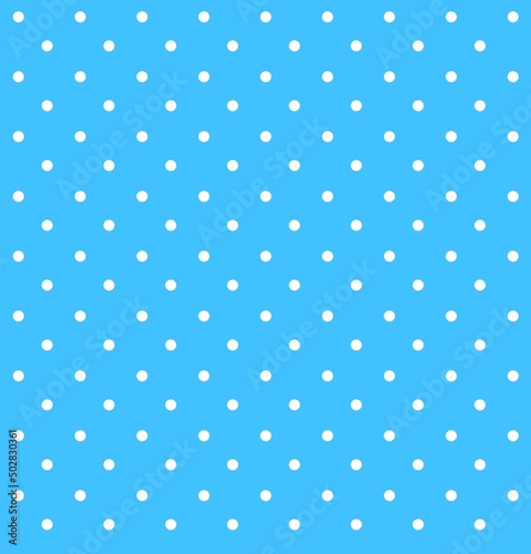 White polkadot with blue background. Pattern