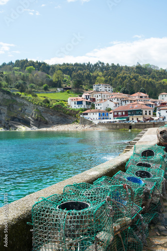 Beautiful view of Tazones, a fisherman village in Asturias. Fishing cages in the harbour