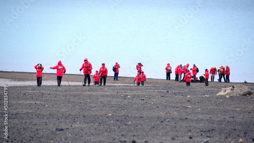 Expedition cruise ship passengers on Deception Island, South Shetland Islands, Antarctica
