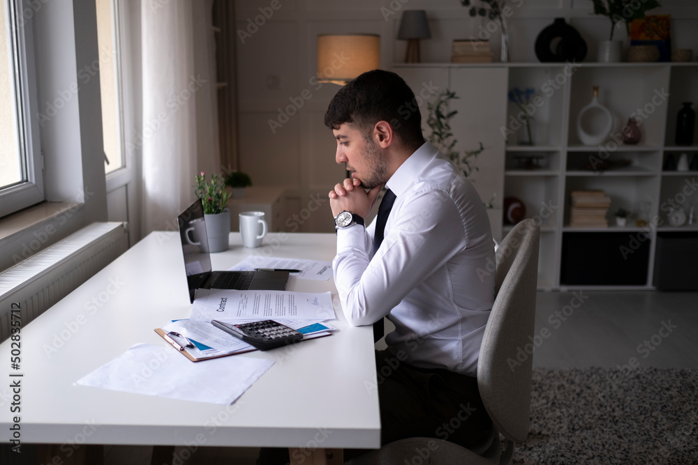 Young man working from home Young man working from home