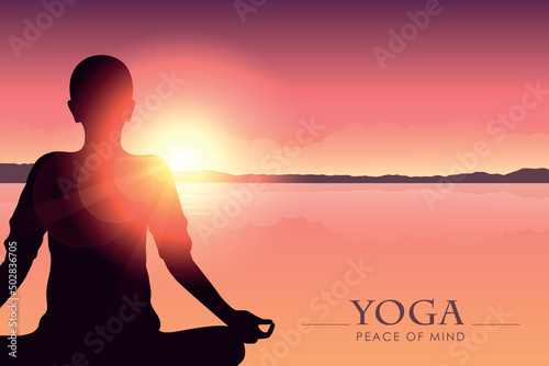 mediating person on the beach at sunset