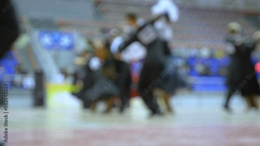 blurred background. ballroom dancing championship, standard program. blurred background. ballroom dancing championship, standard program.