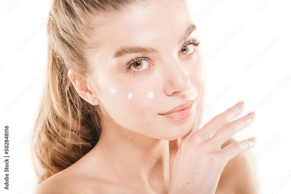 Close up portrait of a girl with cream on her face Close up portrait of a girl with cream on her face