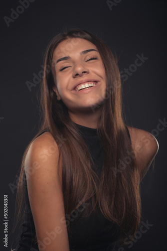 Portrait of girl laughing and posing