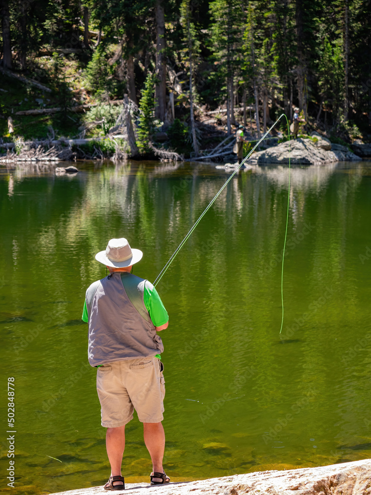 Fototapeta premium People fishing in Marys Lake