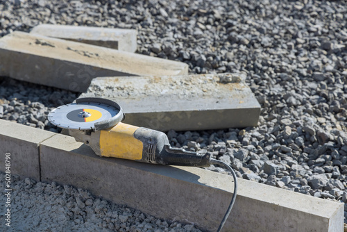 Sawing machine for cutting marble stone at reconstruction area. Closeup