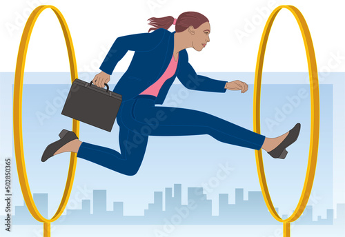 businesswoman jumping through hoops with sky and buildings in background