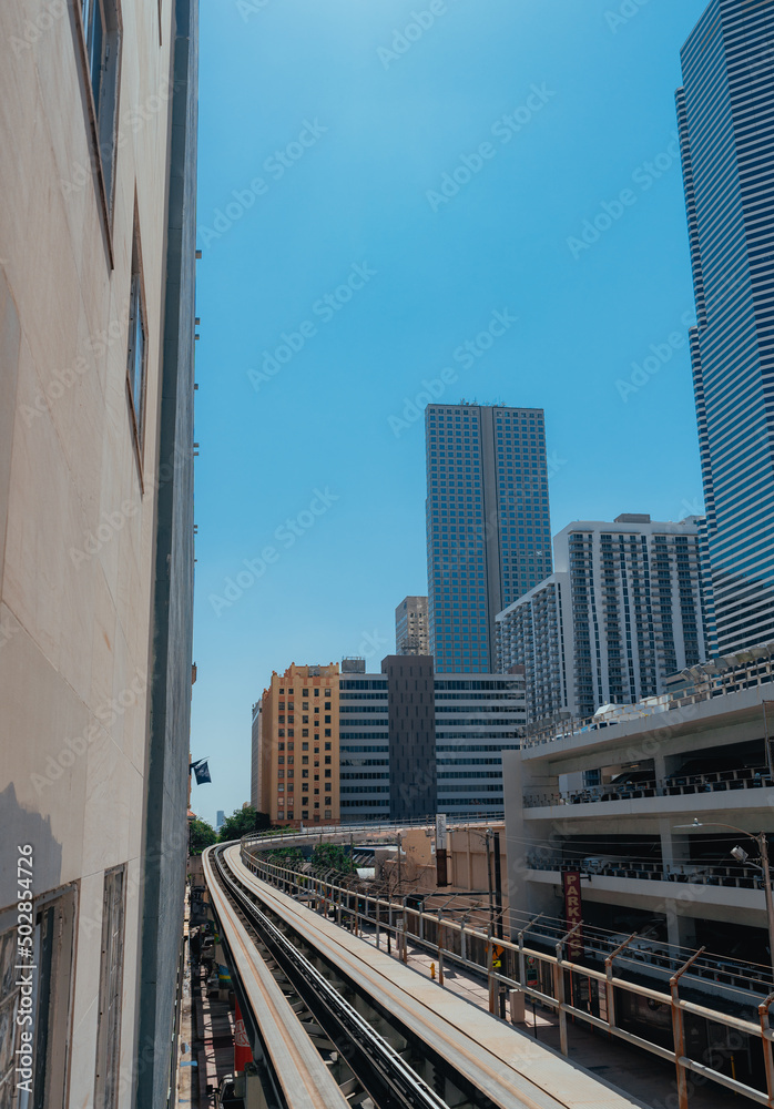 downtown city train buildings sky blue miami