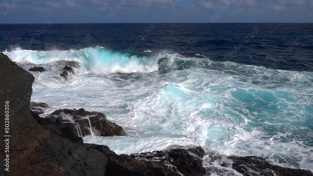 Waves breaking over dangerous rocks on La Palma, slow motion Waves breaking over dangerous rocks on La Palma, slow motion