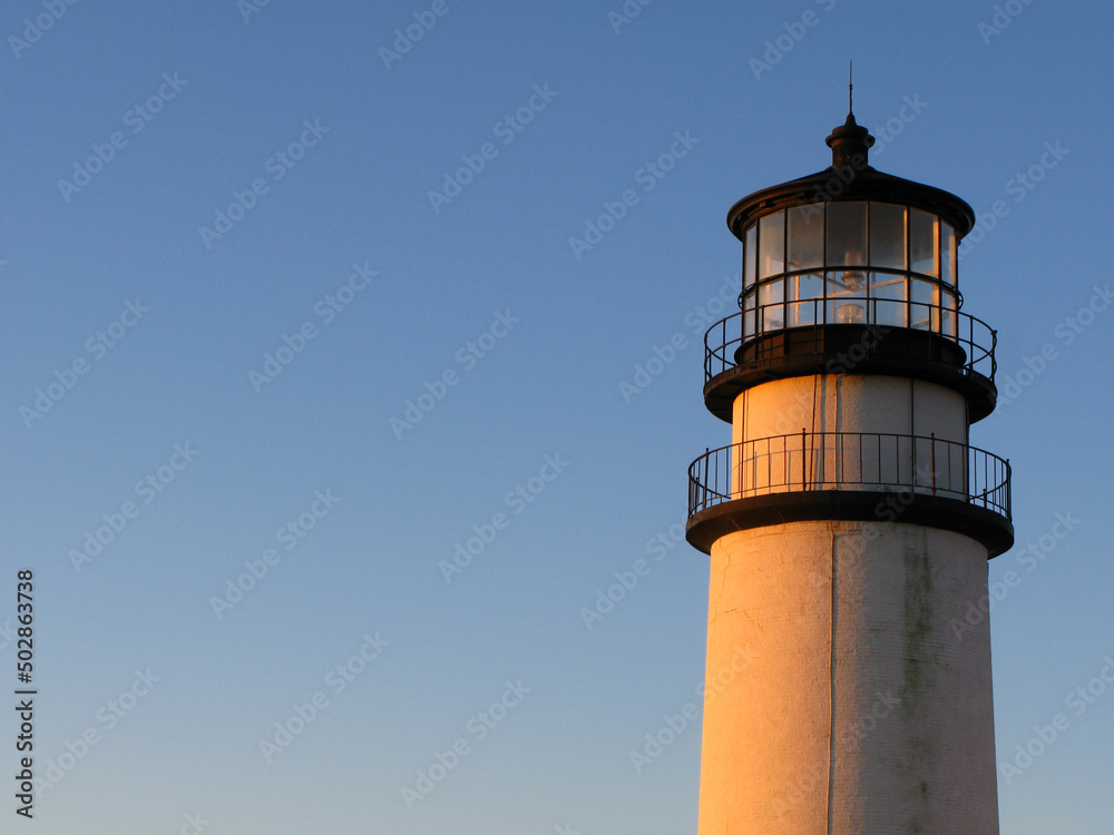 winter sunrise image of the Highland Cape Cod Lighthouse on Cape Cod