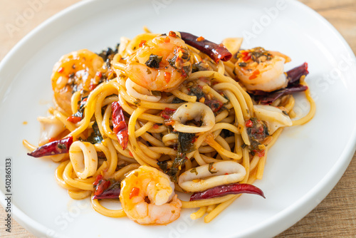 spicy spaghetti seafood on plate