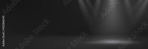 Dark gray backdrop shooting set stage with spotlights and light sparkles for website banner, product presentation, callout text announcements and elemental design showcase
