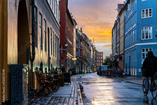 Fototapeta Naklejka Na Ścianę i Meble -  Beautiful sunset on a european narrow street in Copenhagen, Denmark 