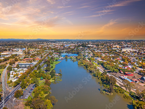 Lake Weeroona Bendigo panoramic view. Sunrise sunset morning evening flight with spectacular landscape and cityscape views. Red purple and blue skies. Central Victoria Australia.